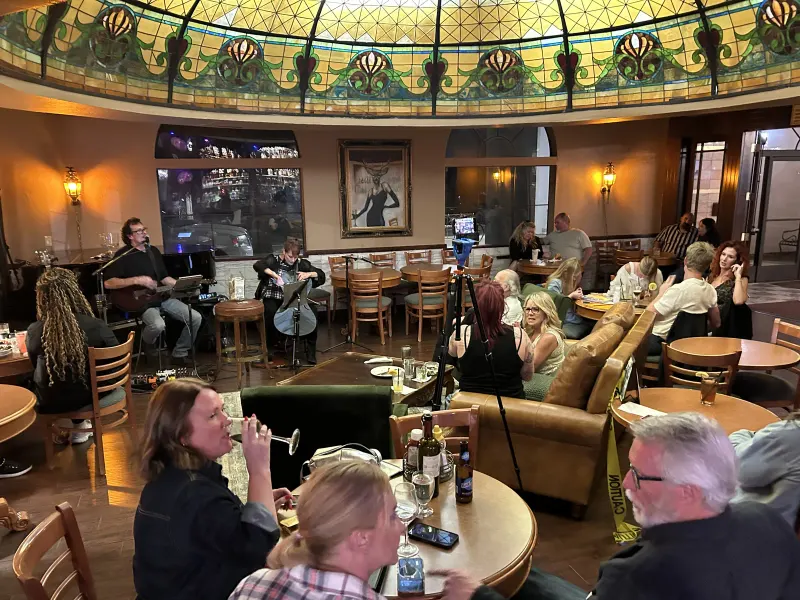 A full room under the Tiffany Dome on a live music night