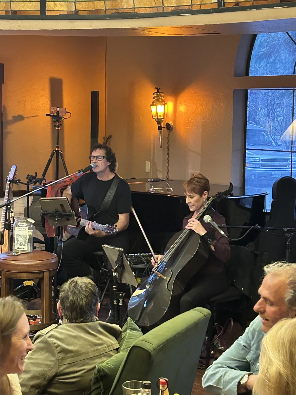 Duke & Peg, guitar and cello, playing to the room